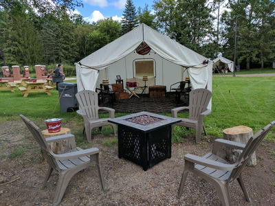 Seating inside and outside the glamping tent
